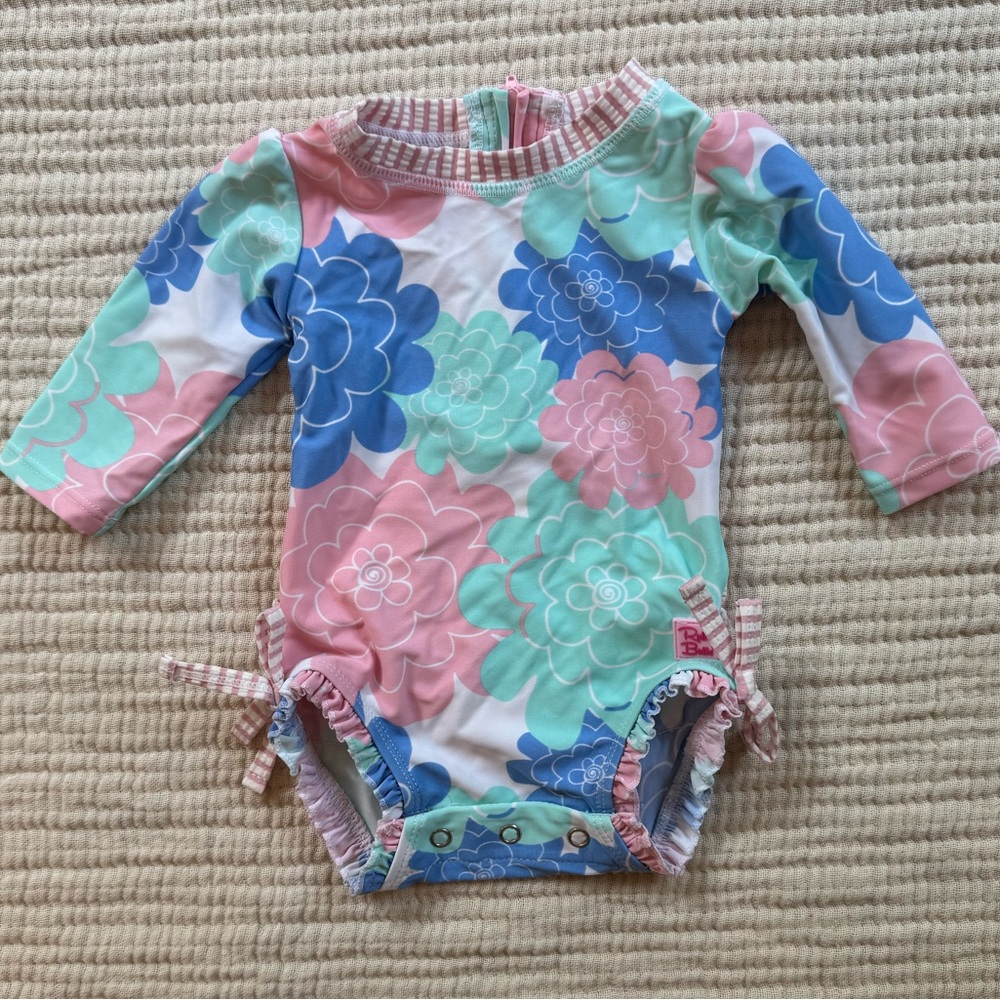LIKE NEW Ruffle Butts Pastel Floral Baby Swimsuit